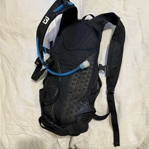 Salomon hiking pack. 10L pack with 1L bladder.